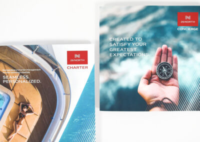 A photo of marketing collateral for 26 North Concierge and Charter, produced by Qualprint