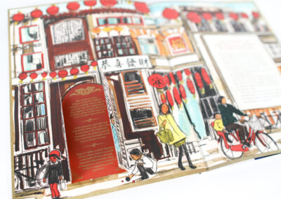 A photo of Korn Ferry's printed catalog with die cut windows opened to reveal additional text